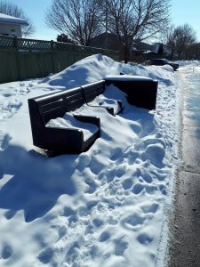 snow covered bench