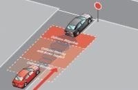 Une voiture qui en suit une autre à une distance sécuritaire 